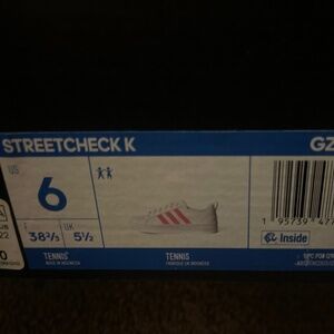 Pink And white adidas